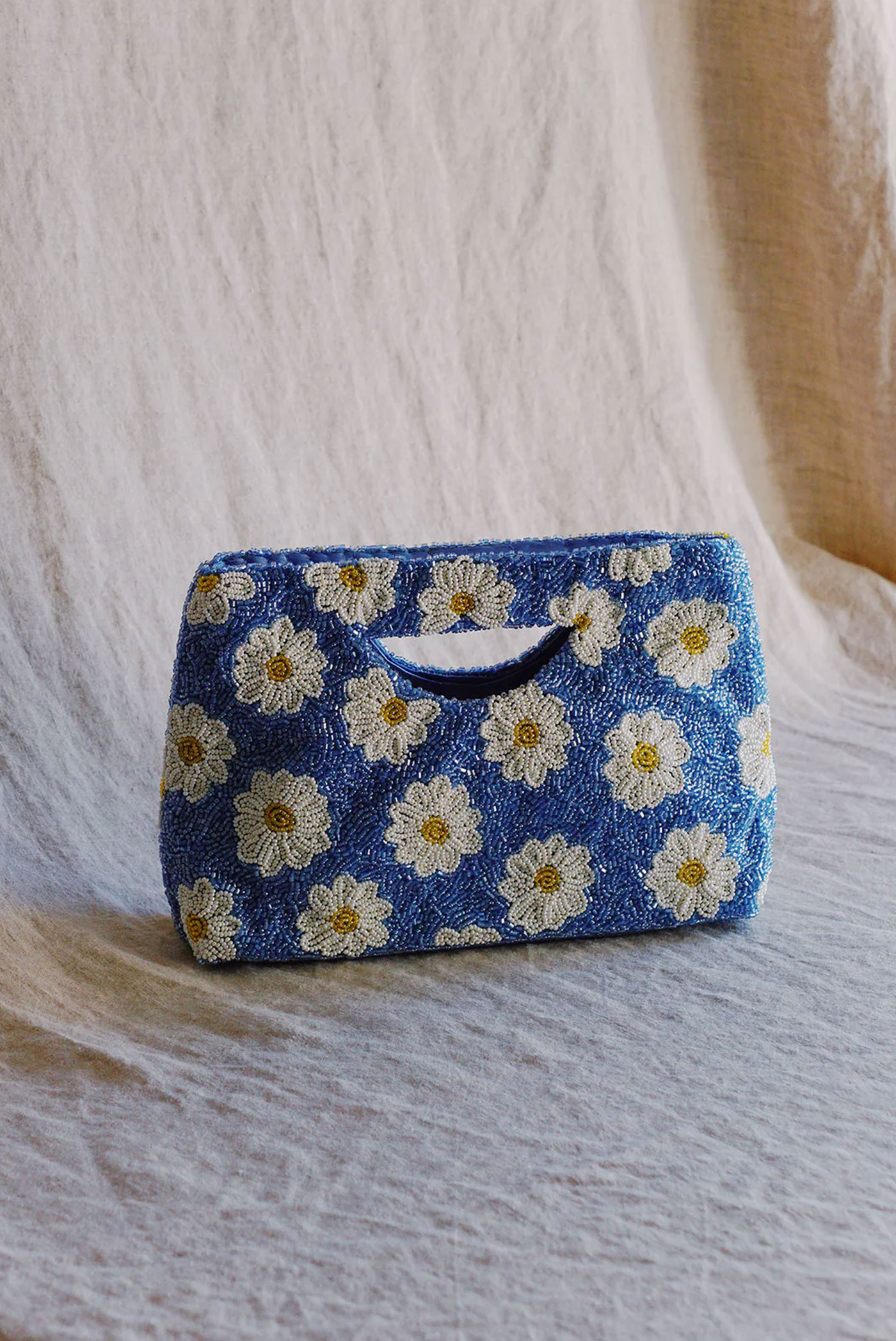ethically made daisy beaded bag by wallflower shop