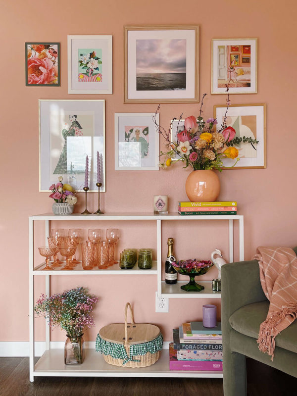 Pink gallery wall with vintage glassware and Meet Cute from Clare paint