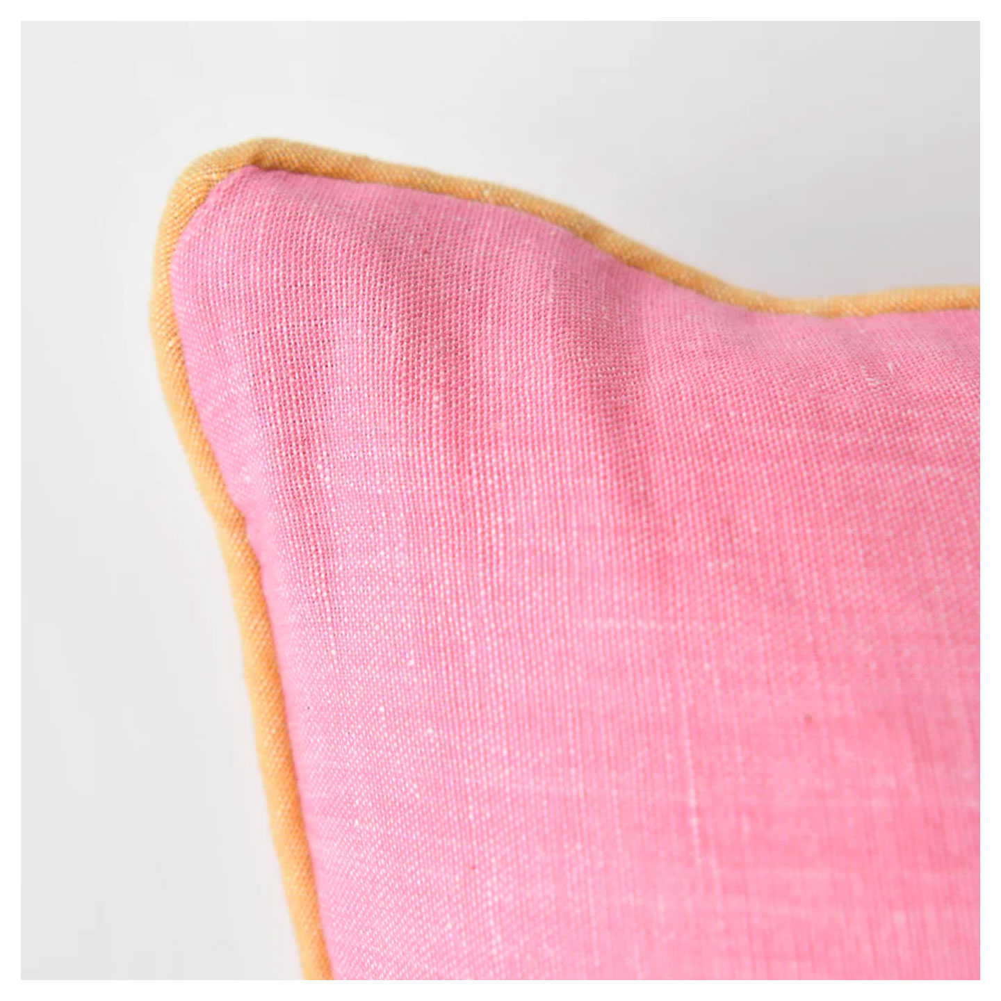 pink cotton linen pillow with orange piping from Garza Marfa