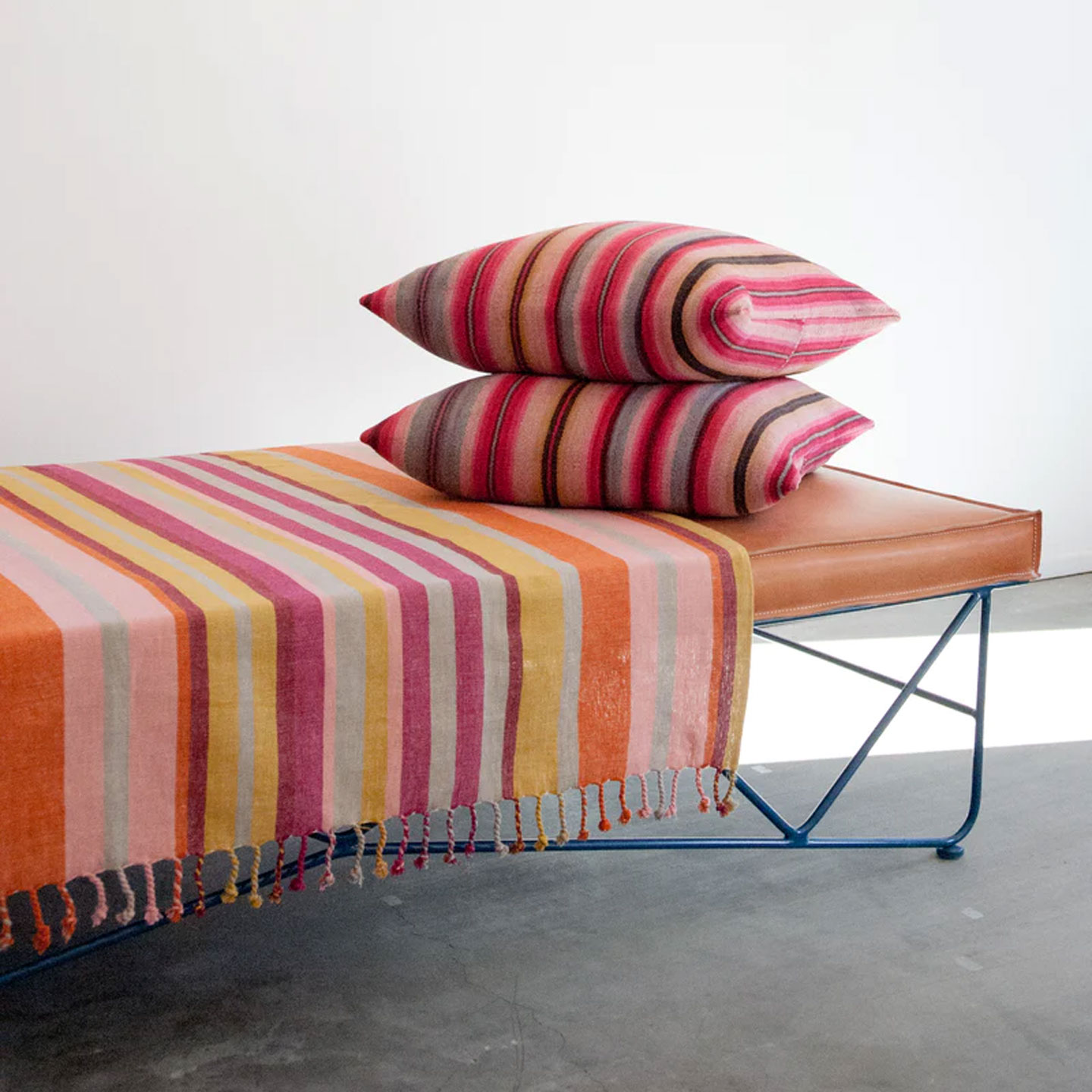 colorful boho striped pillows and blankets from Garza Marfa