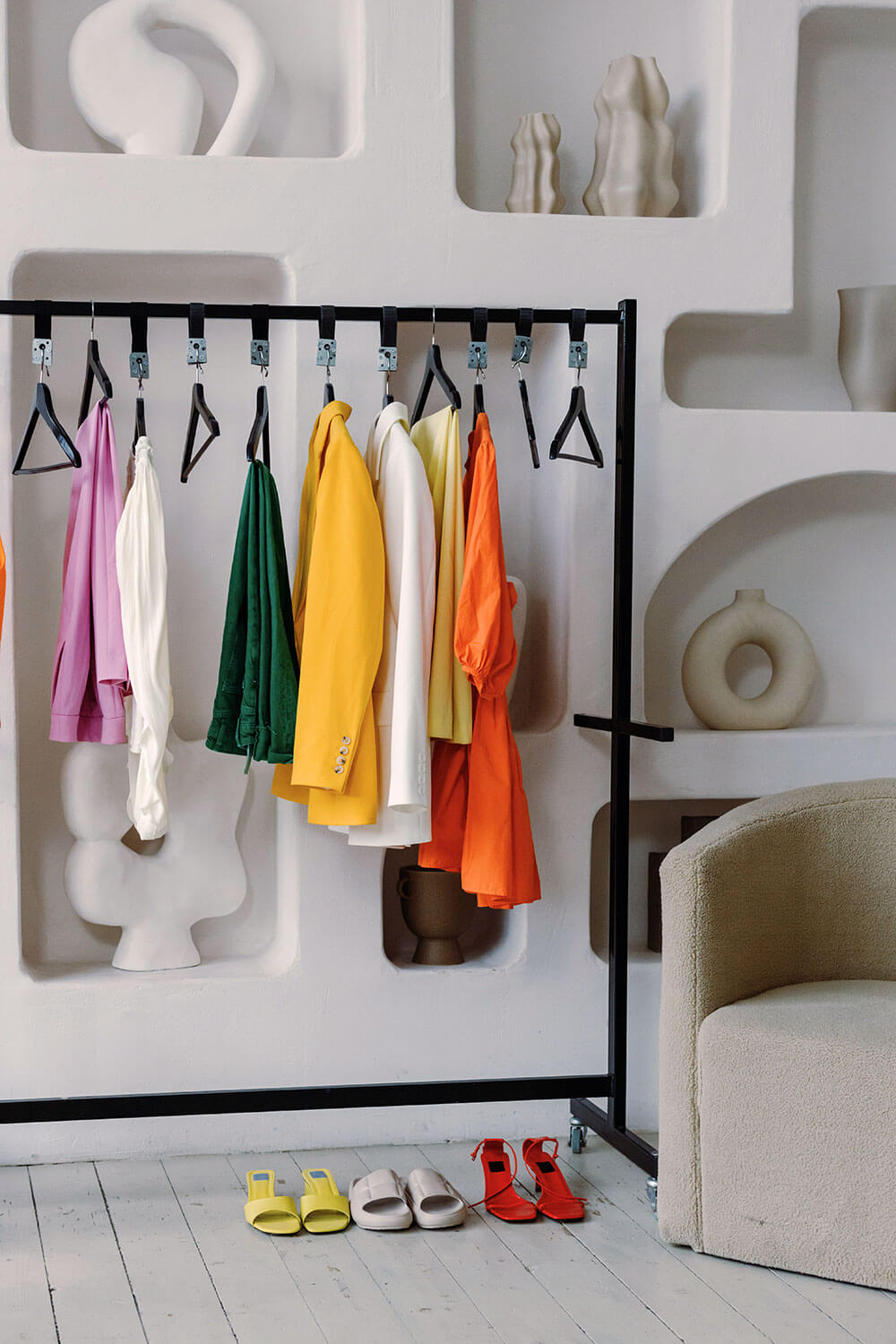 colorful rack of clothing from fast fashion brands to avoid