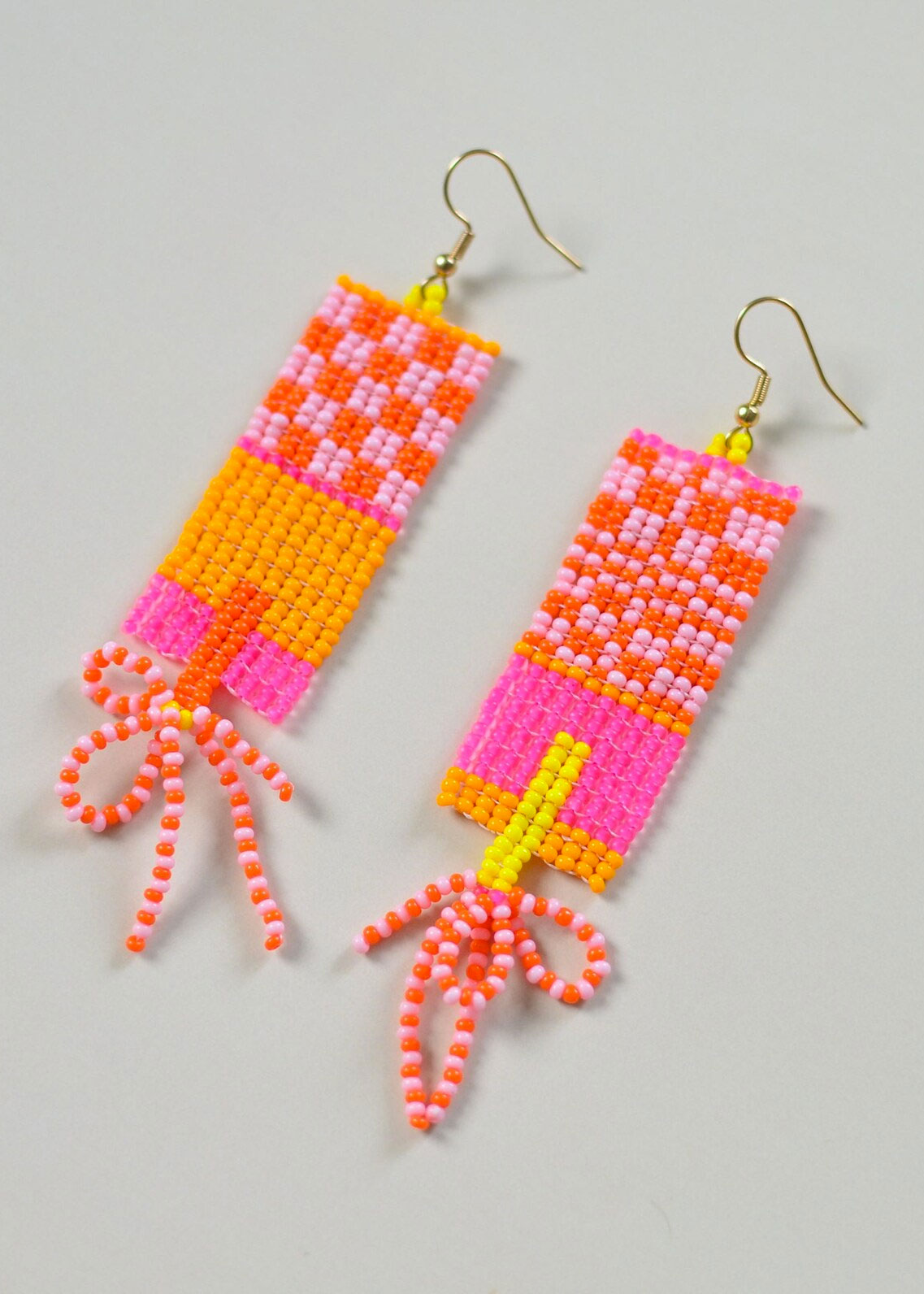 check colorblock seed beed earrings in pink and orange by Boosiko