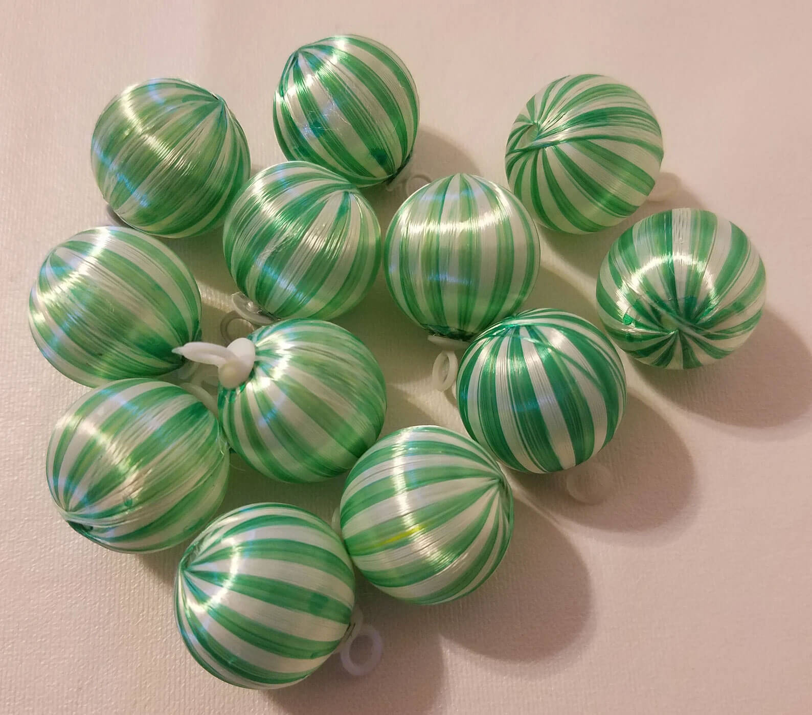 Striped satin green Christmas bulbs
