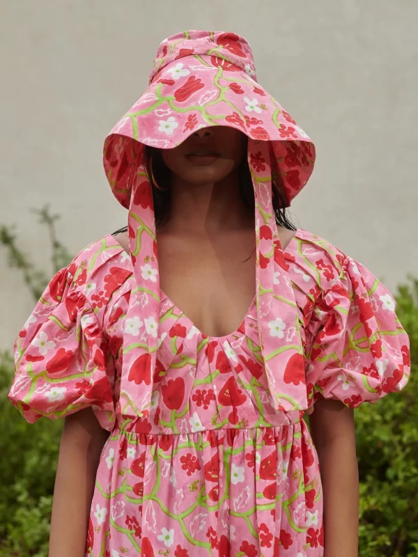 colorful bucket hat and ethically made dress by ikkivi