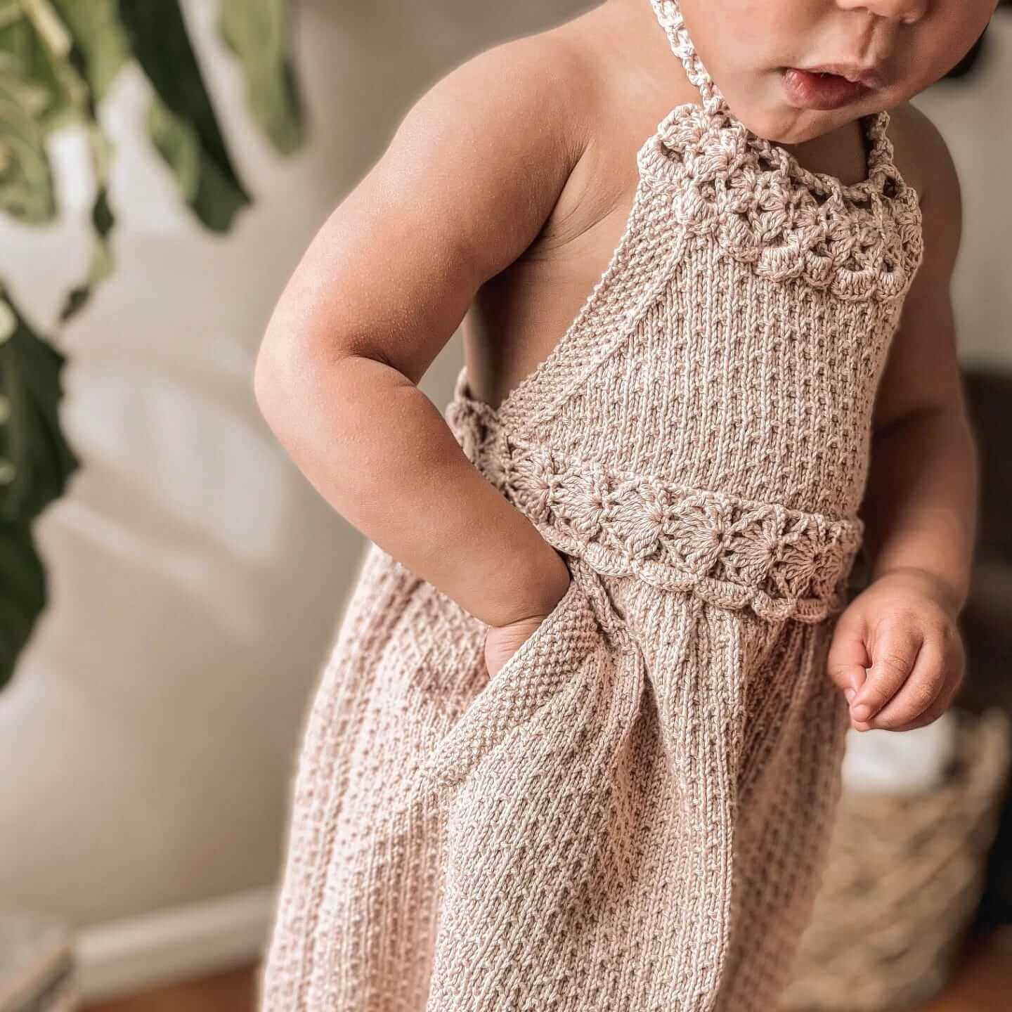 toddler wearing hand knited baby clothes by JuneBee Baby artisan clothing