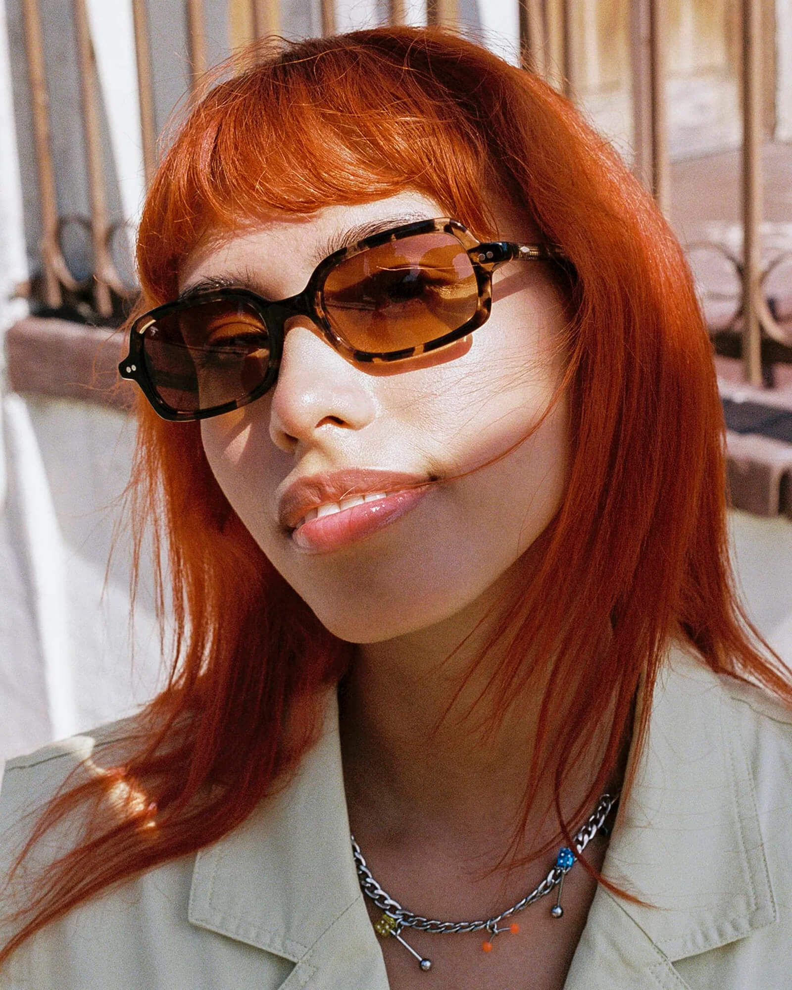 woman wearing unisex bioacetate sunglasses by crap eyewear