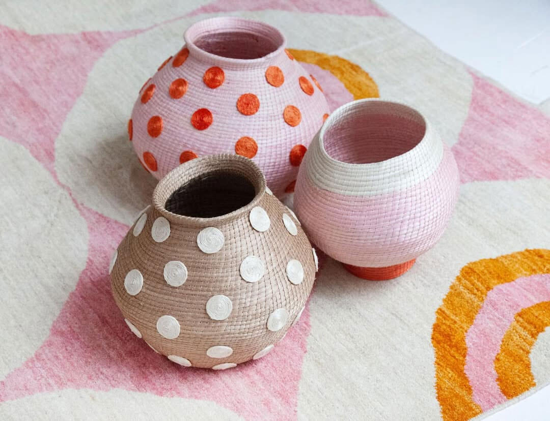 pink pastel baskets and rug by fair trade decor shop charlie sprout