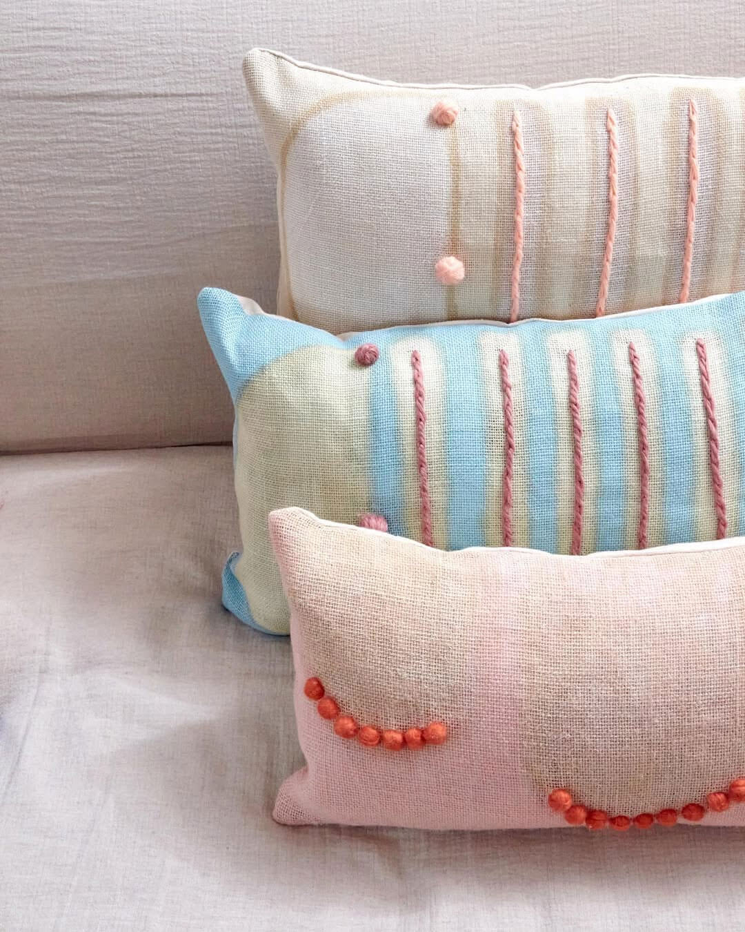 pastel woven pillows by fair trade luxury home decor shop charlie sprout