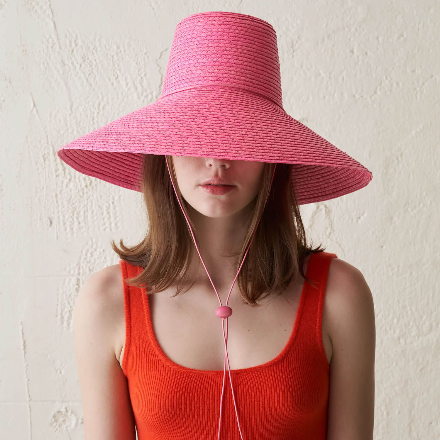 pink wide brim beach hat by fair trade brand Artesano