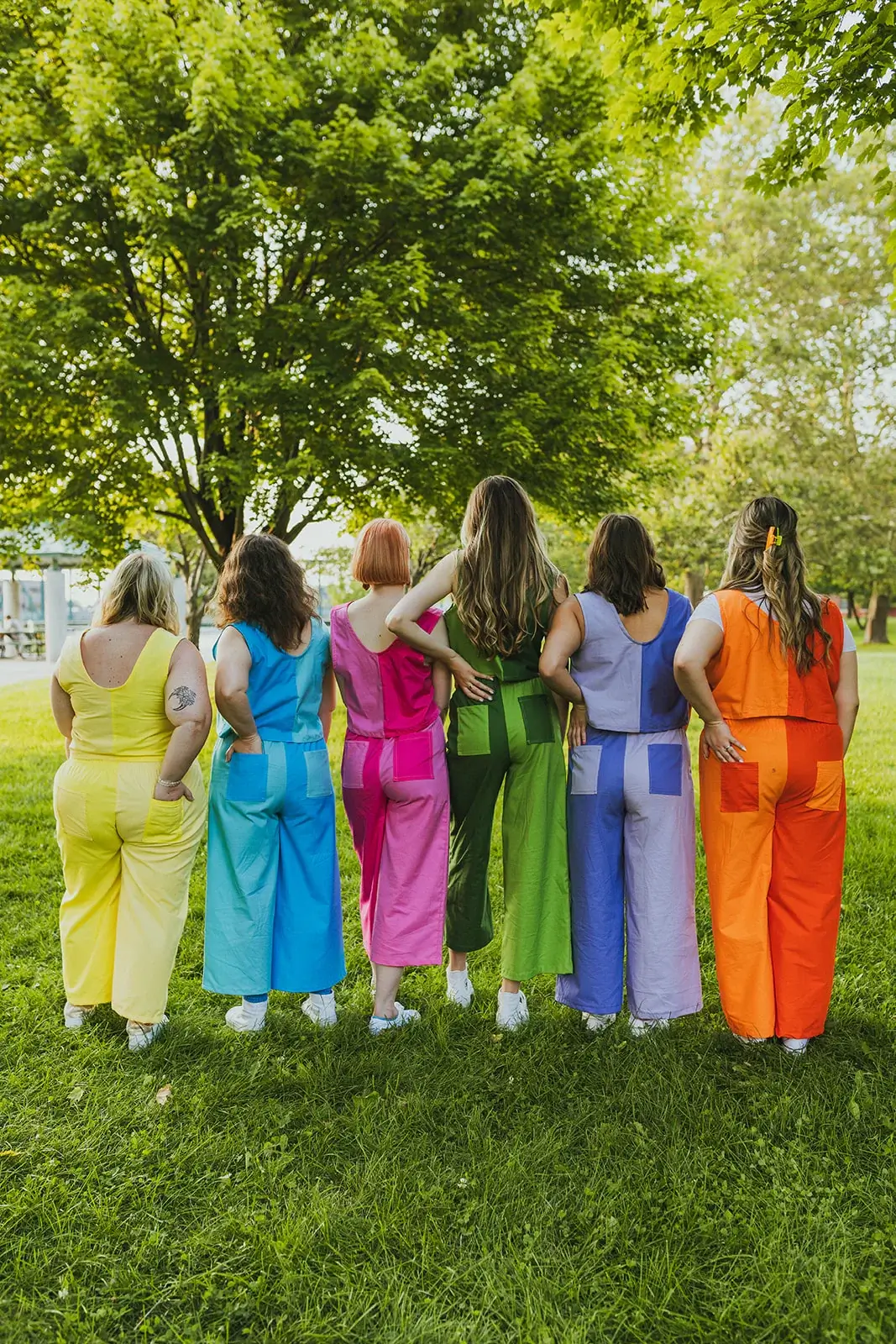 women wearing a rainbow of colorful clothes in custom sizes by sustainable slow fashion brand isabella eve apparel