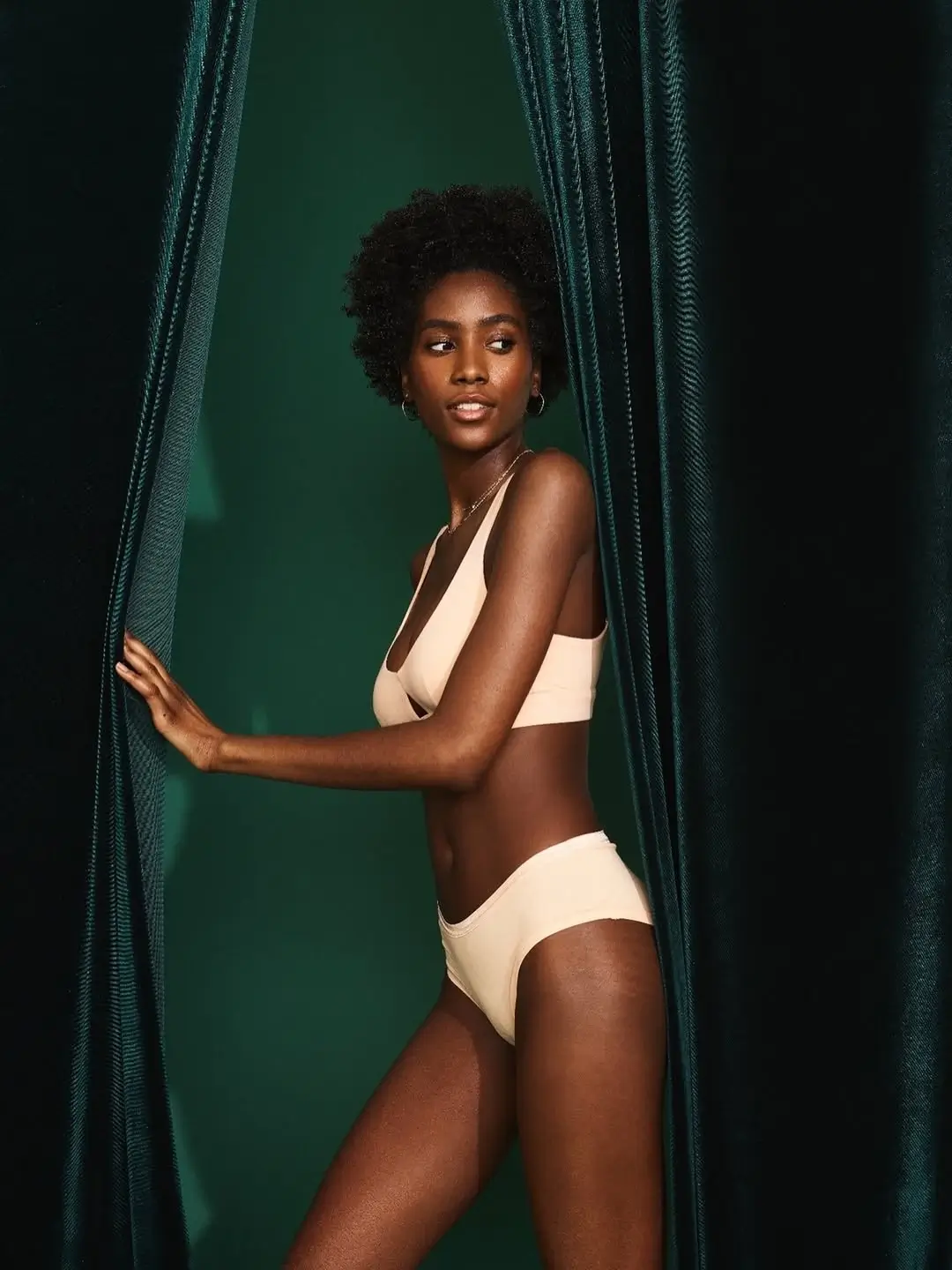 woman wearing organic underwear and bra by sustainable brand subset