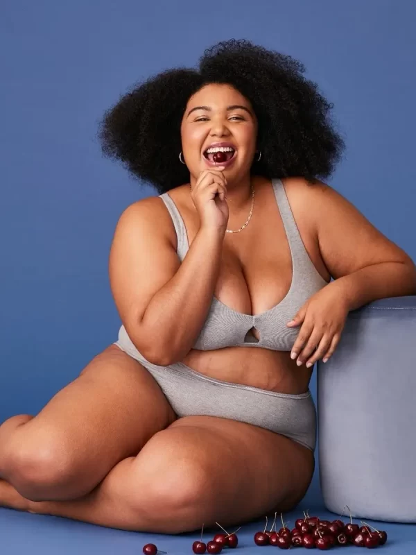 woman wearing gray organic cotton bralette and undies by subset underwear