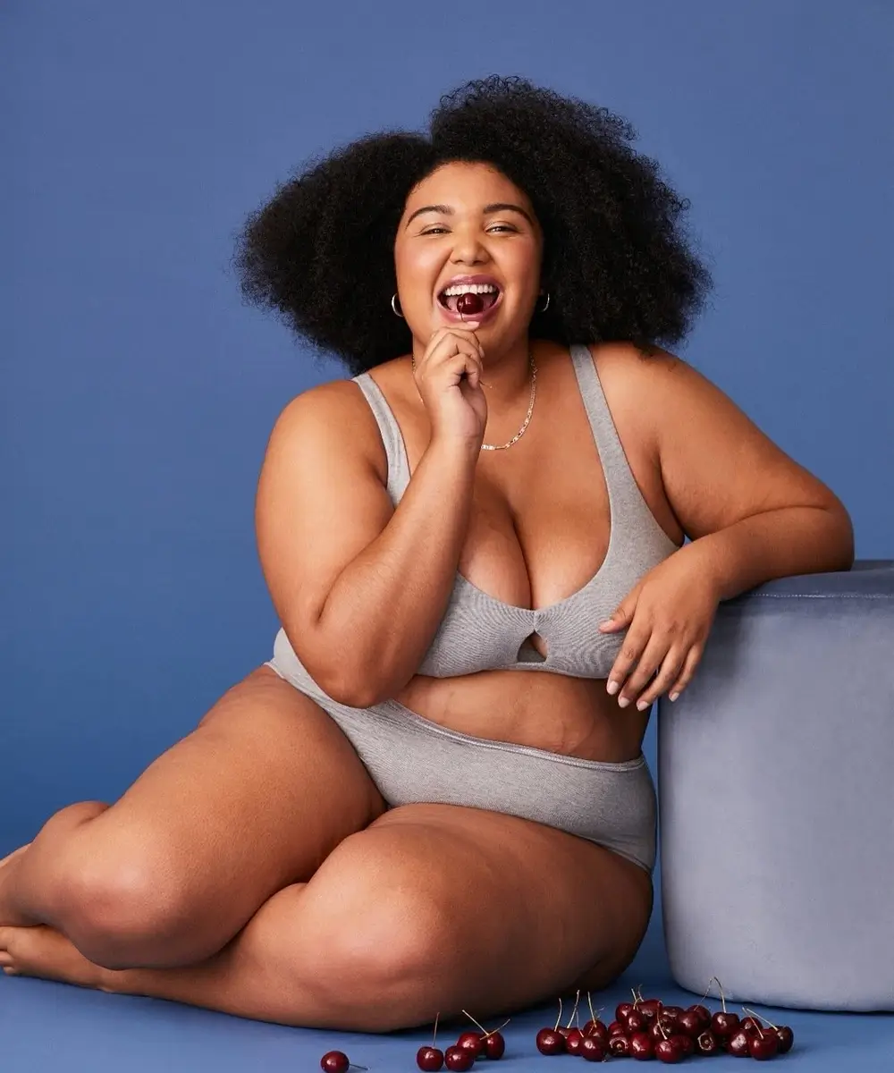 woman wearing gray organic cotton bralette and undies by subset underwear