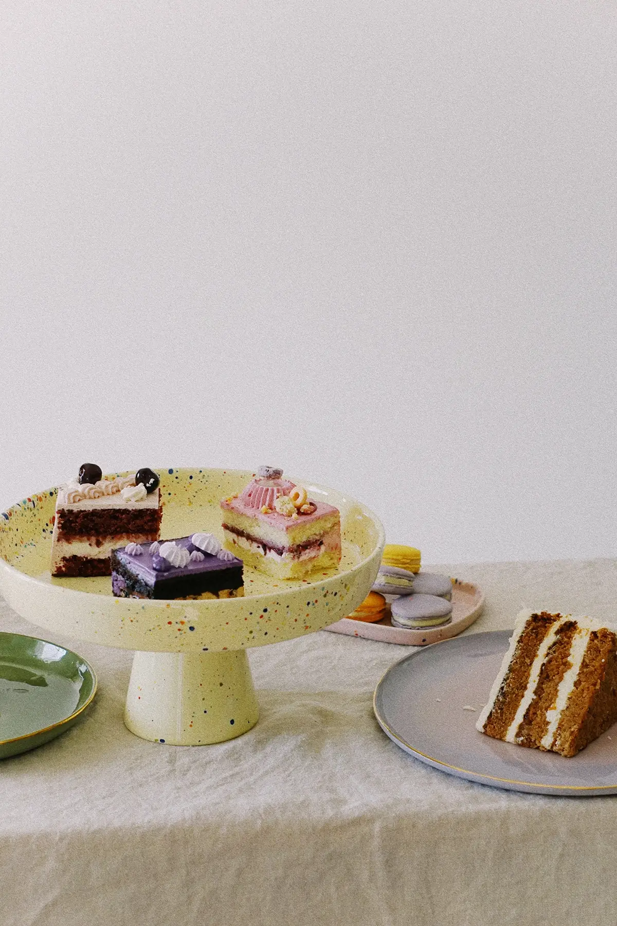 yellow cake stand and desserts - wallflower shop