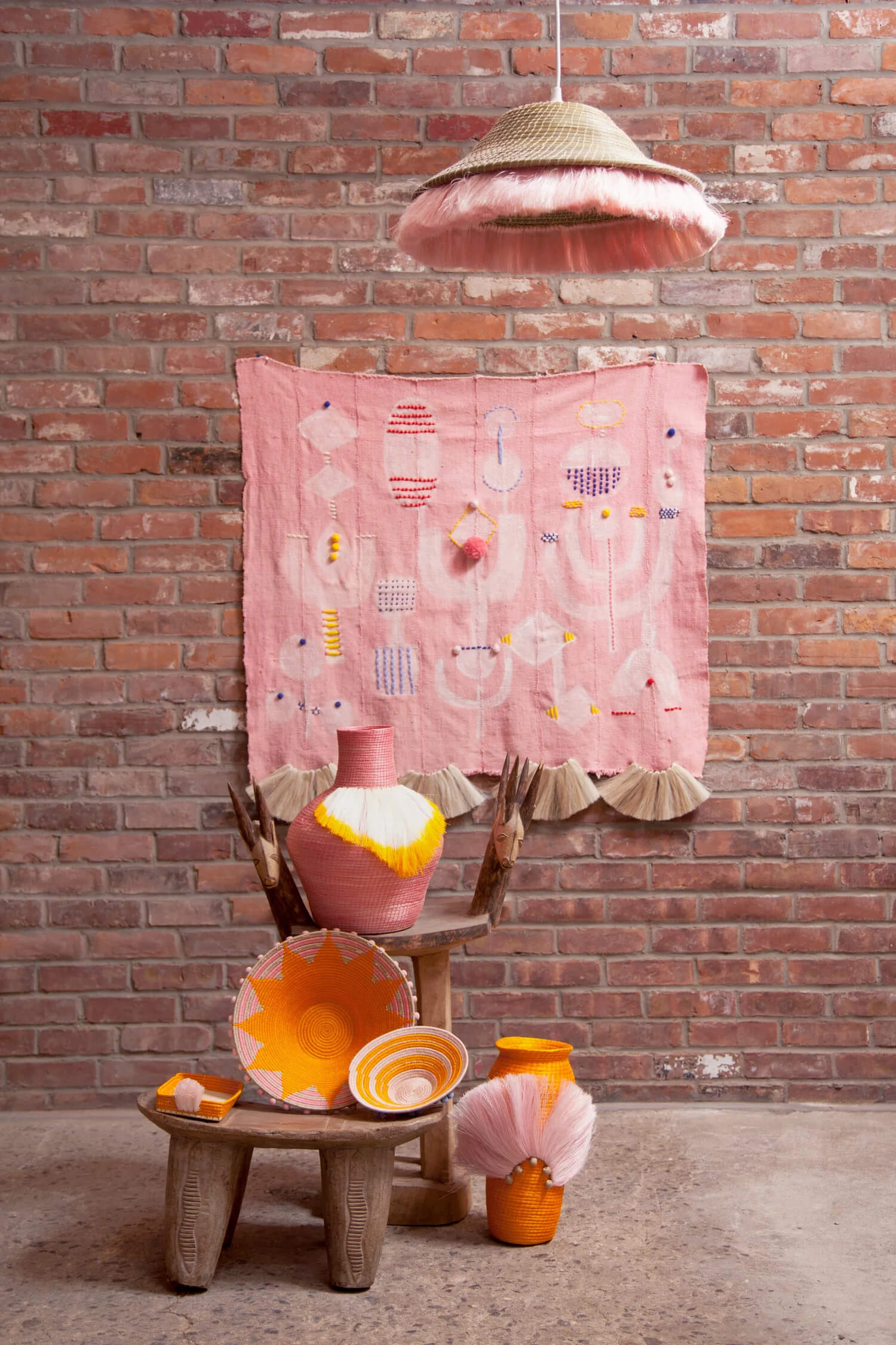 pink rug and baskets by luxury decor brand charlie sprout