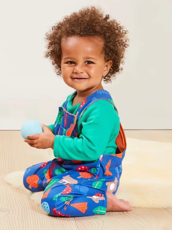 boy wearing organic cotton baby clothes by toby tiger
