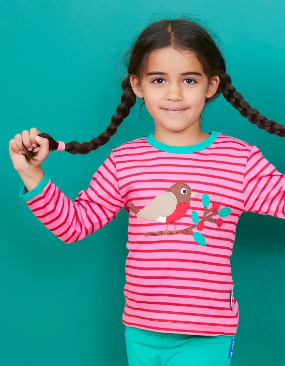 girl wearing colorful ethical & sustainable kids clothes