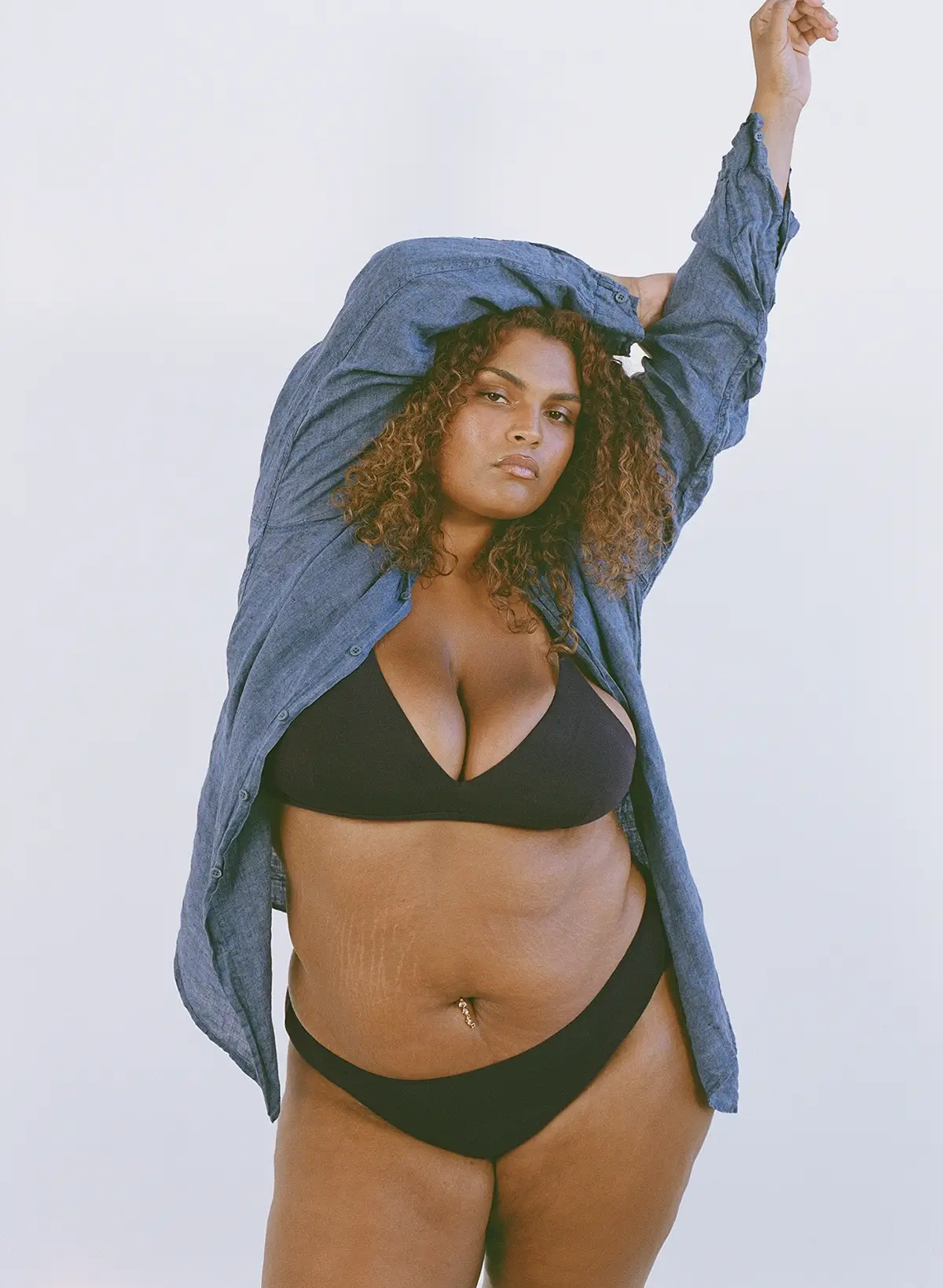 plus size model wearing Lela Organic bralette and underwear